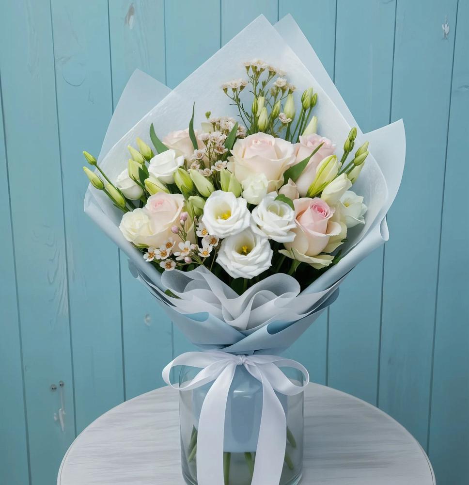 Букет цветов из: Розы и Лизиантусы в Северный